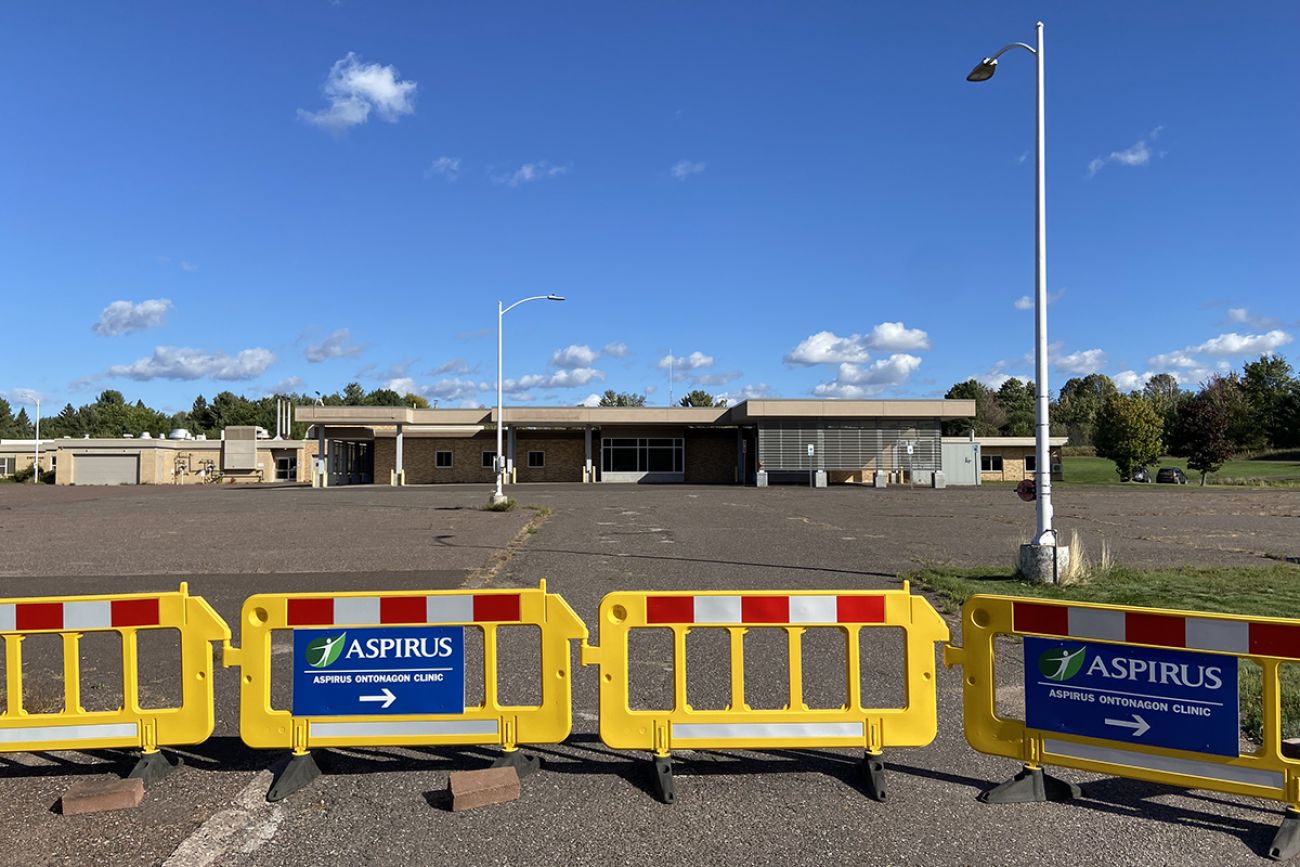 Orange barricades blocking a parking lot