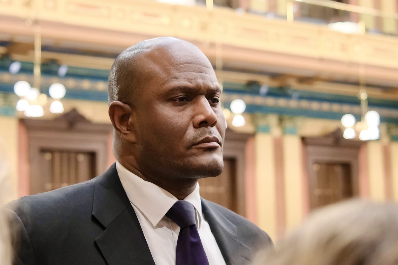 Michigan House Speaker Joe Tate of Detroit, wearing a suit