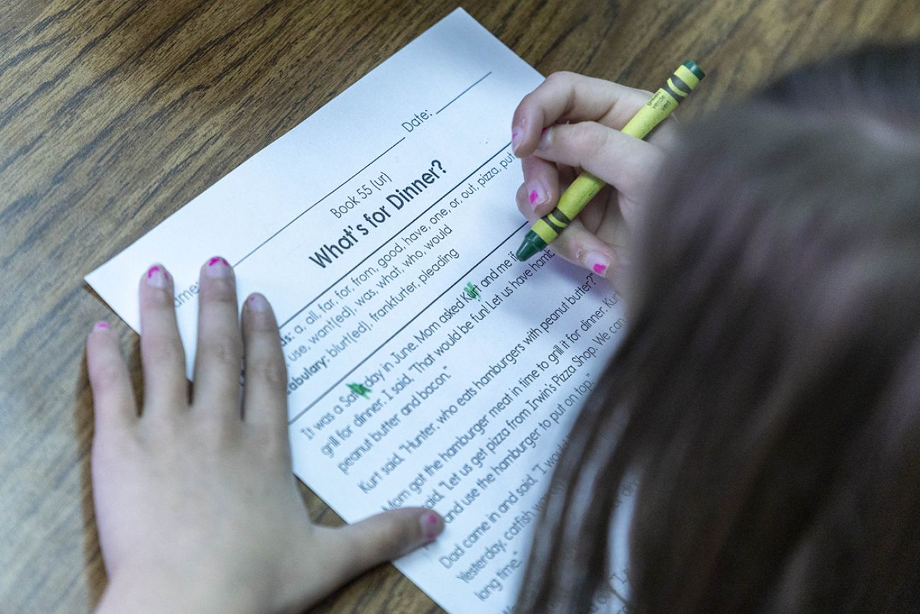 A student completing a workshop.