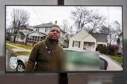 A TV display shows Patrick Lyoya in Grand Rapids, Michigan.